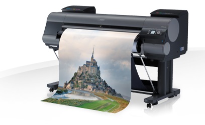 Фотография печатающего принтер Canon (справа) Печатающий принтер Canon(справа)