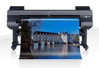 Фотография принтера Canon печатающего картины (спереди) Принтер Canon печатает картины (спереди)
